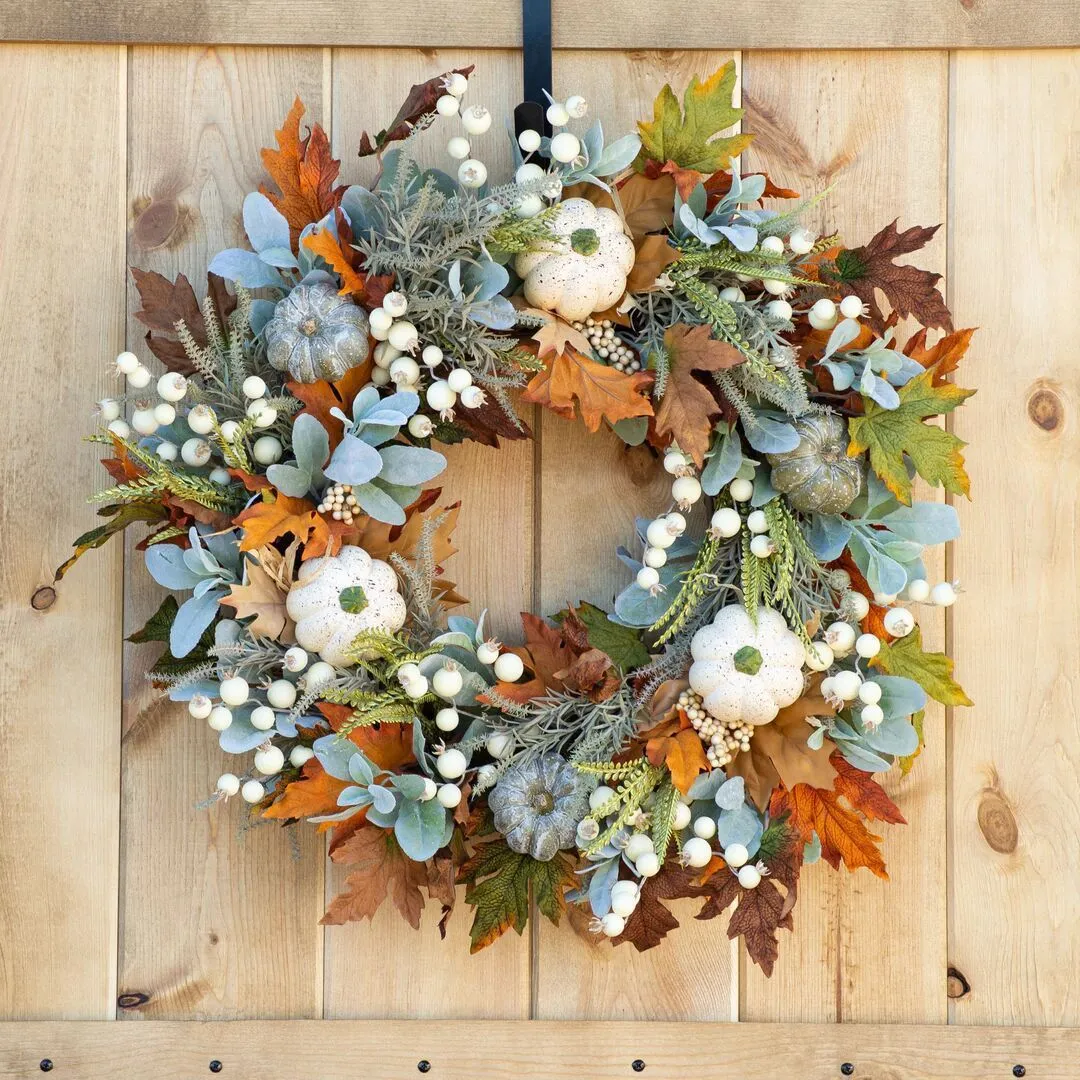 Pumpkin wreath with simulated frost leaves and pumpkins on a rattan ring base, 45x45cm size