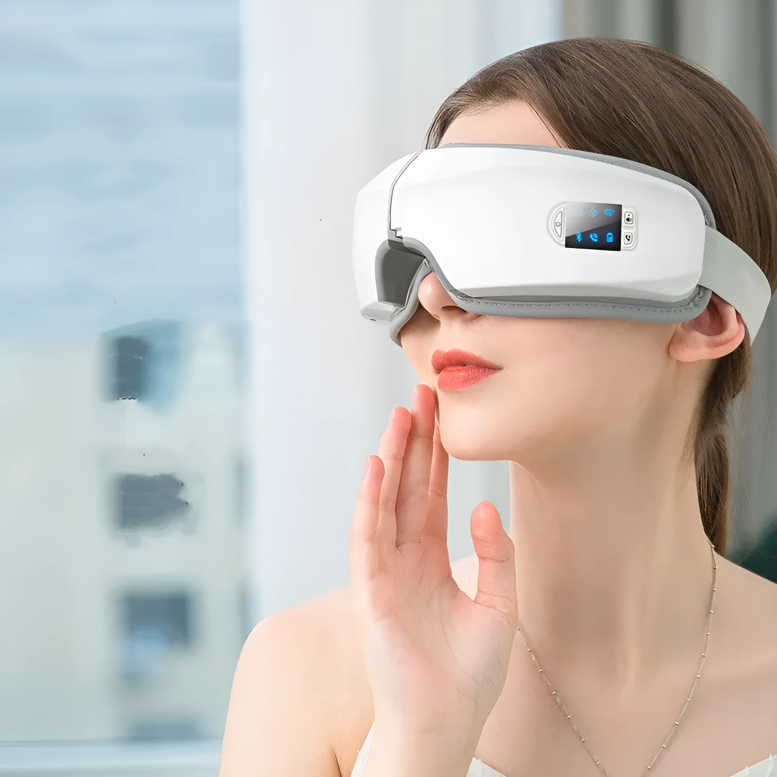 White eye massager with PU cover, LCD screen, and folding USB design for eye fatigue relief
