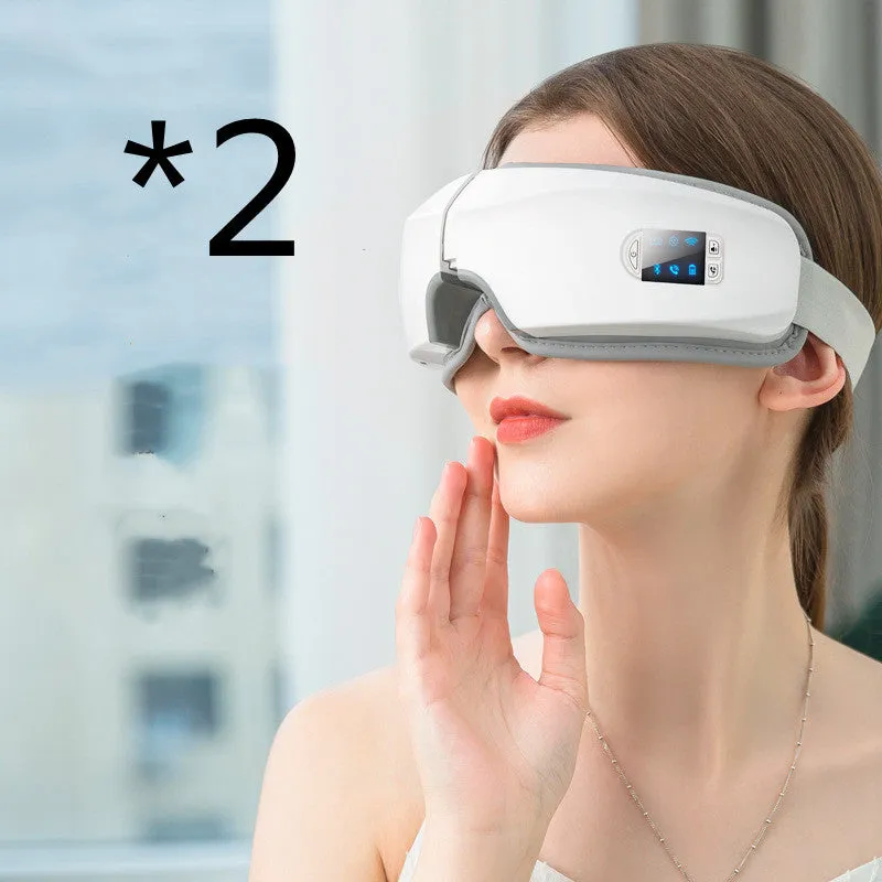 White eye massager with PU cover, LCD screen, and folding USB design for eye fatigue relief