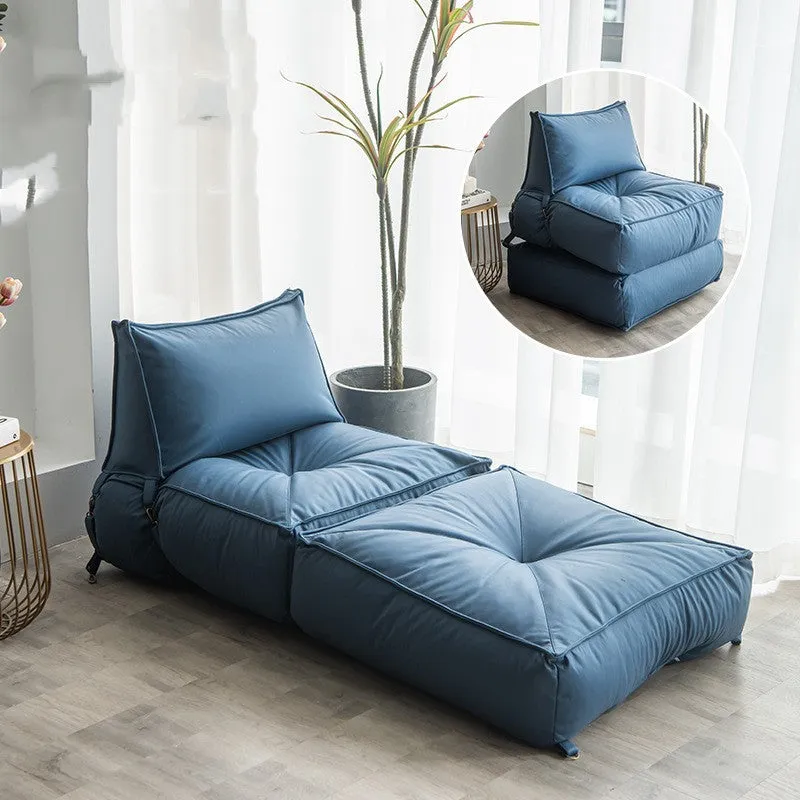 Folding back chair with fabric cover and fine-particle filler in a bedroom setting, navy blue colour option