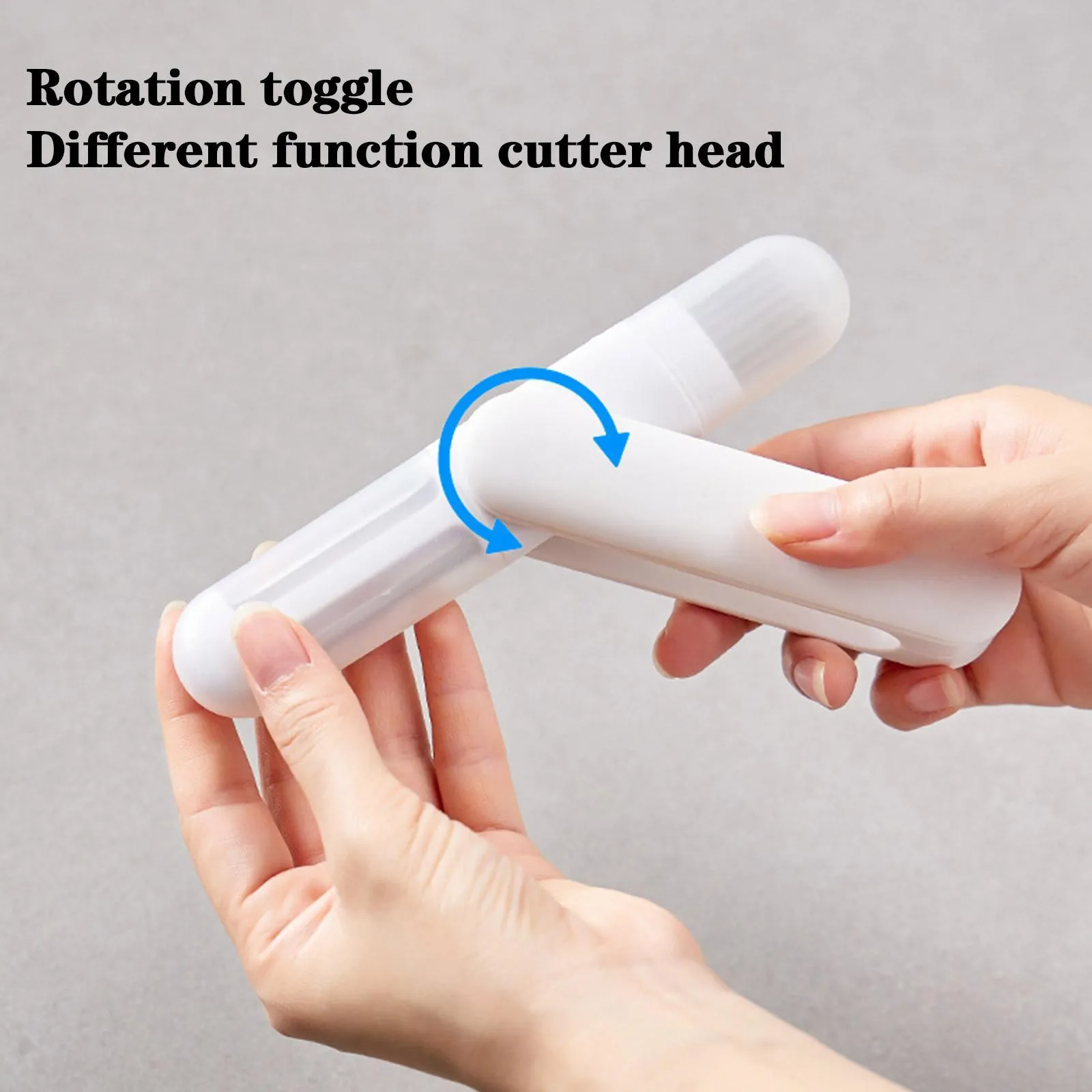 White 3 in 1 rotary paring knife with 360 degree rotating stainless steel blade on a kitchen counter