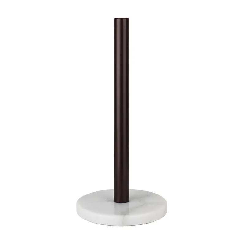 Marble kitchen roll holder with stainless steel gilded finish on kitchen countertop