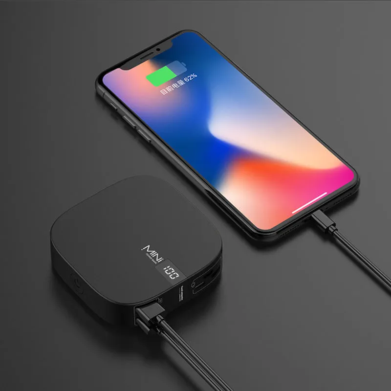10000 mAh mini power bank with digital display in black, compact portable charger with two USB ports