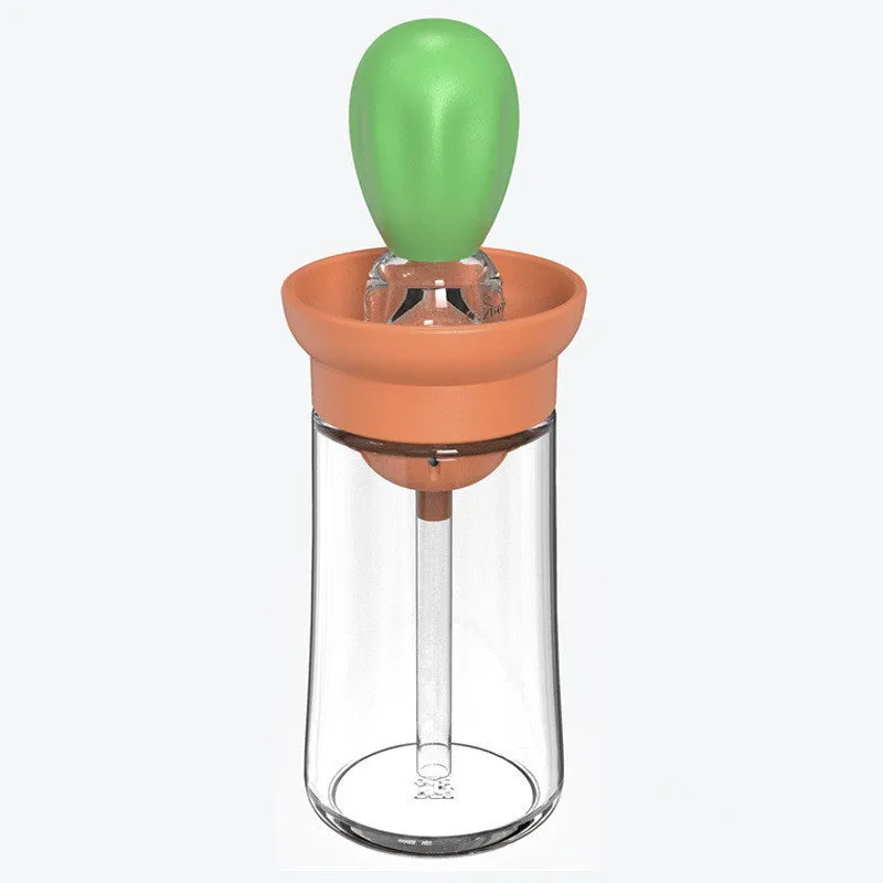 Creative silicone brush head press metering oil bottle in red with glass body and silicone brush top for kitchen use