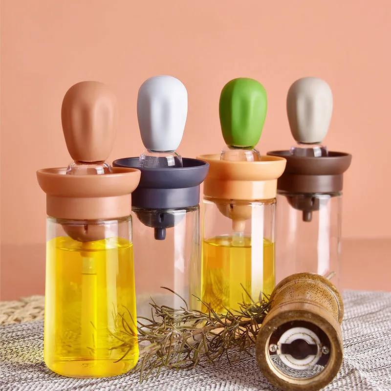 Creative silicone brush head press metering oil bottle in red with glass body and silicone brush top for kitchen use