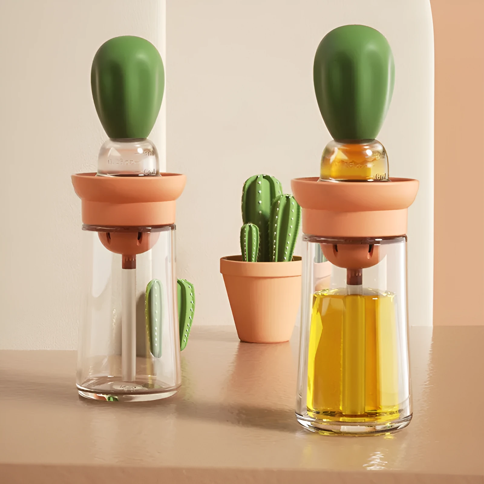 Creative silicone brush head press metering oil bottle in red with glass body and silicone brush top for kitchen use