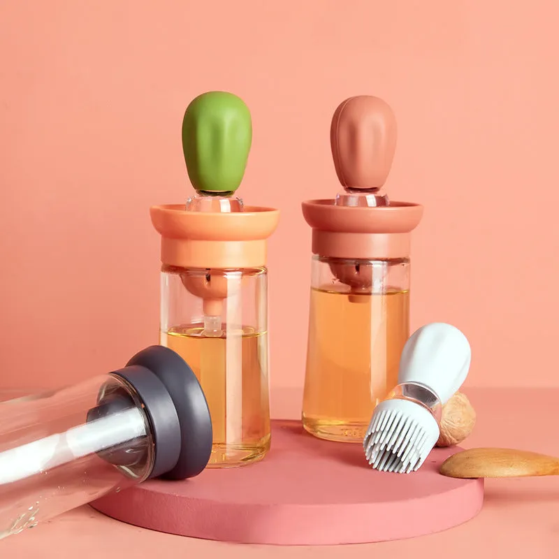 Creative silicone brush head press metering oil bottle in red with glass body and silicone brush top for kitchen use