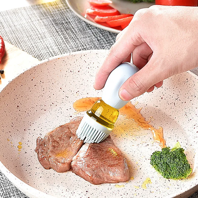 Creative silicone brush head press metering oil bottle in red with glass body and silicone brush top for kitchen use