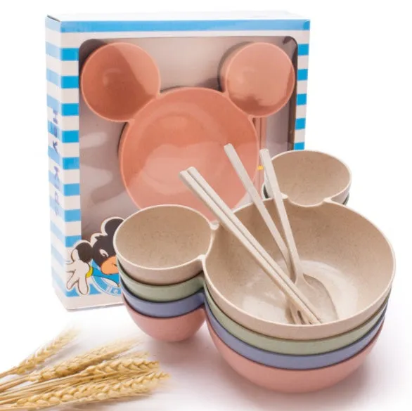 Children's wheat straw bowl set featuring Mickey cartoon design with chopsticks, fork, and spoon in beige