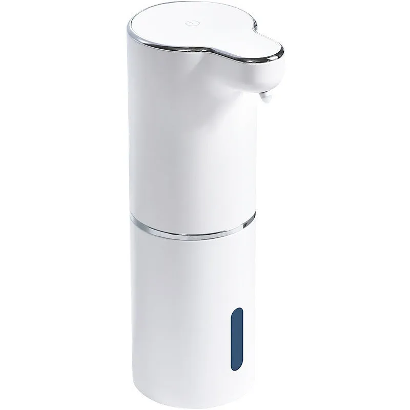 White ABS automatic sensor soap dispenser on countertop with USB cable, dispensing foam hand sanitiser.