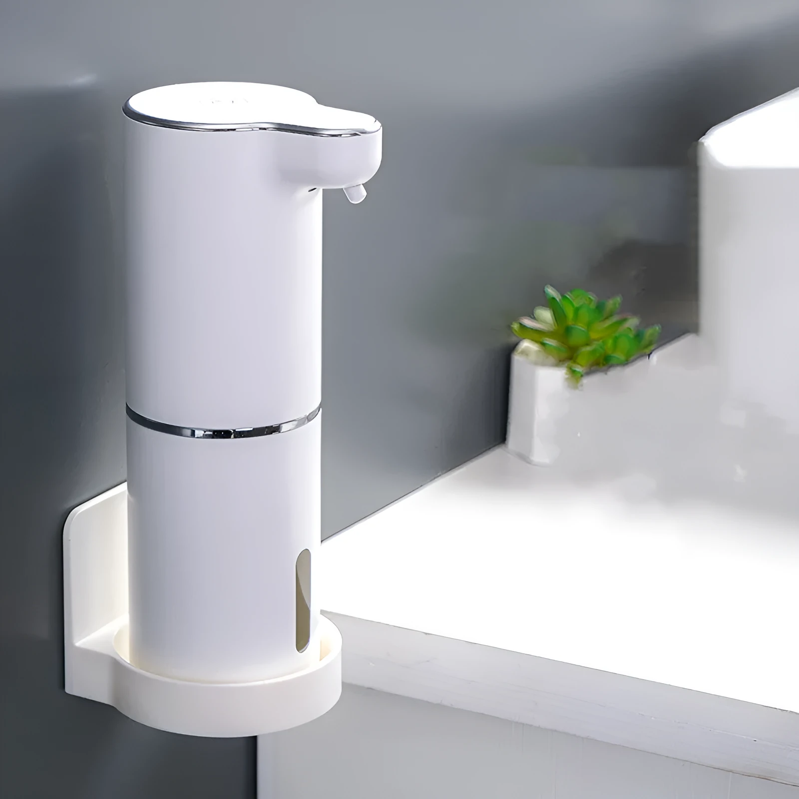 White ABS automatic sensor soap dispenser on countertop with USB cable, dispensing foam hand sanitiser.