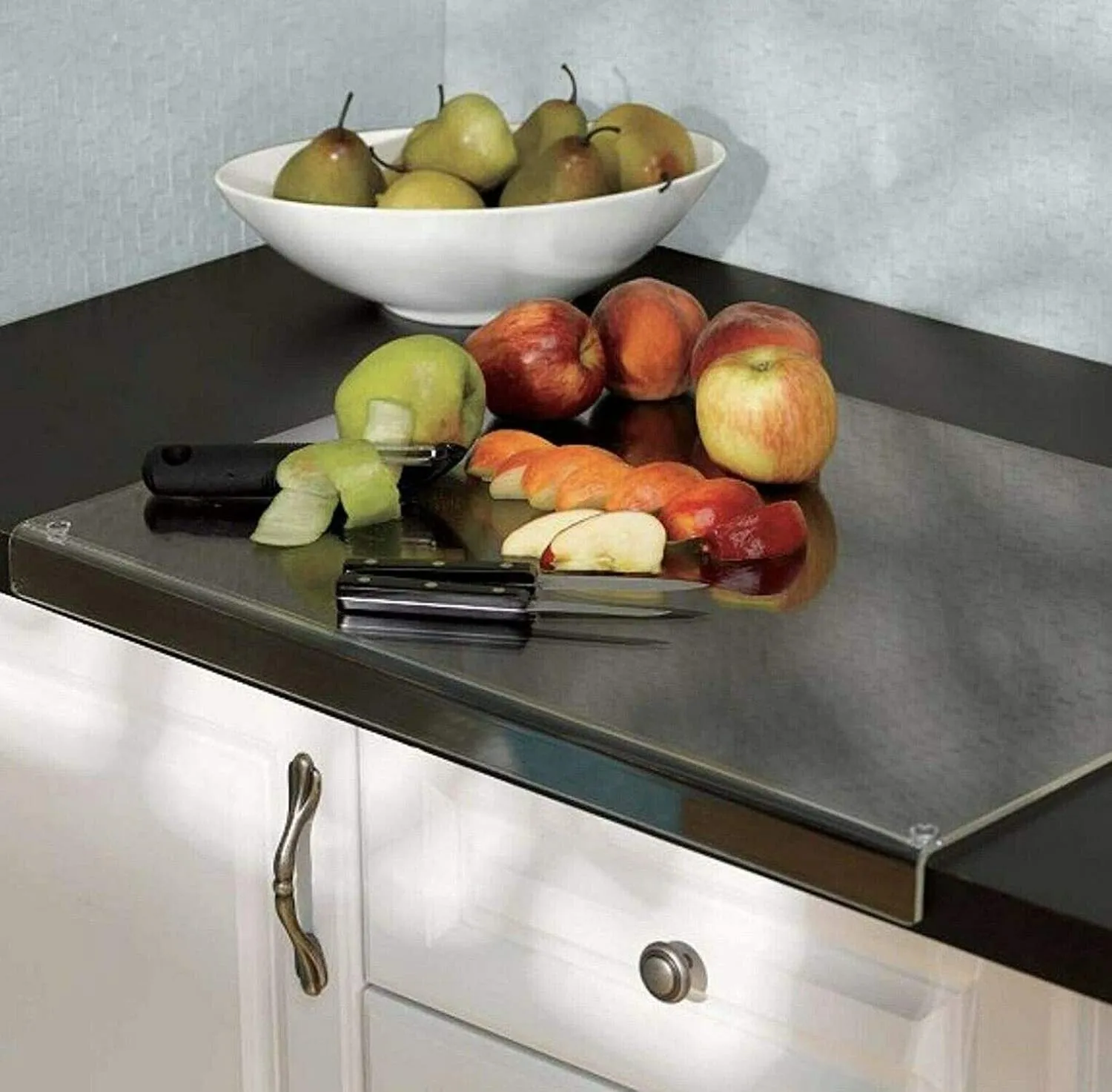 Transparent acrylic cutting board with anti-slip base, square shape, available in multiple sizes for kitchen use