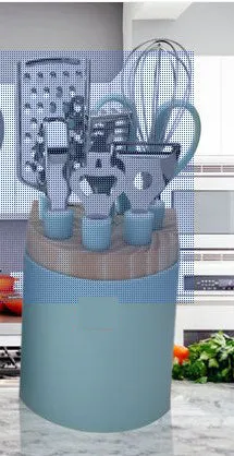Stainless steel kitchen gadget set with whisk, grater, peeler, fruit knife, scissors, and tray lifter in grey