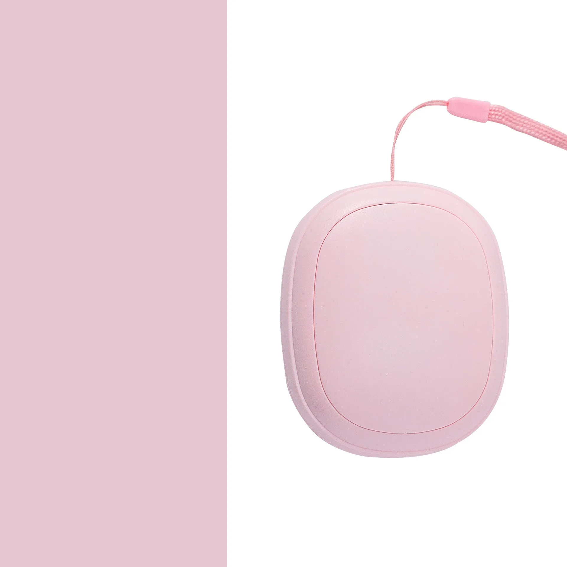 USB hand warmer in pink with three-gear temperature control and compact pebble design