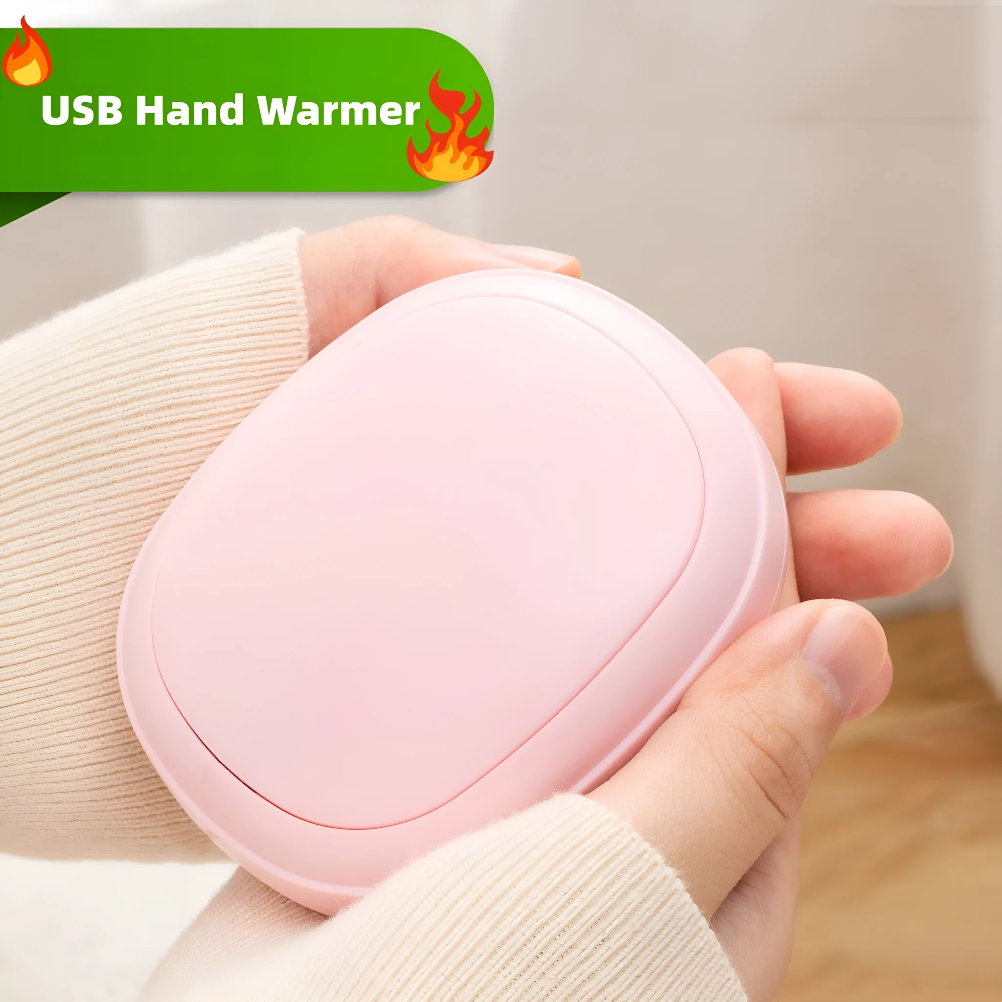 USB hand warmer in pink with three-gear temperature control and compact pebble design