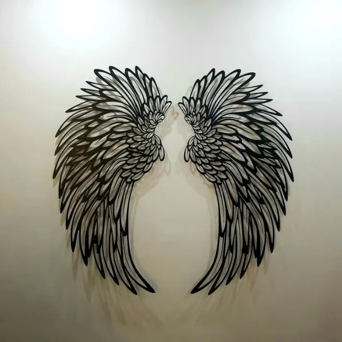 Carved metal wall decor with light, angel wings design, double-sided black iron, 35cm pair on a wall
