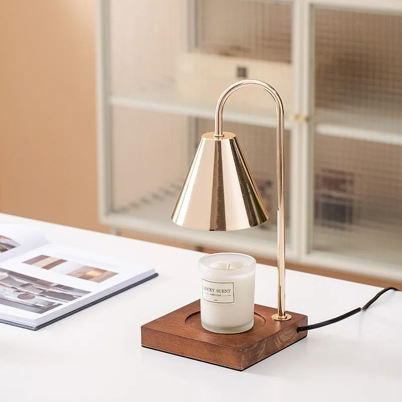 Wax melting lamp with oak wood base and white iron lampshade on a bedside table