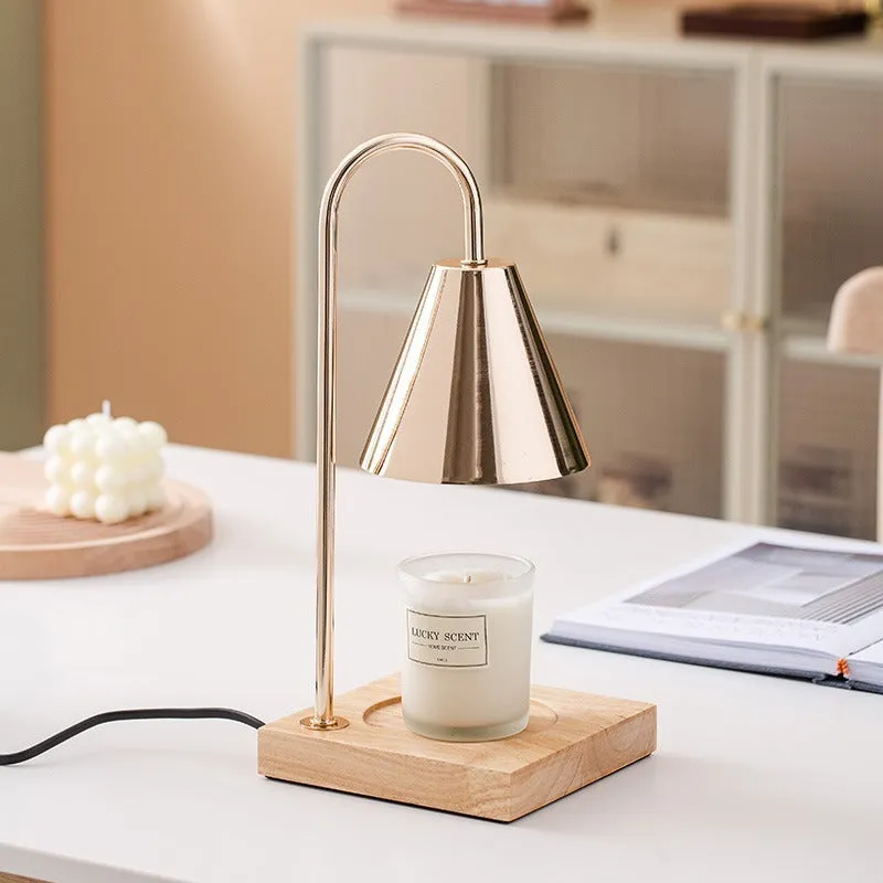 Wax melting lamp with oak wood base and white iron lampshade on a bedside table
