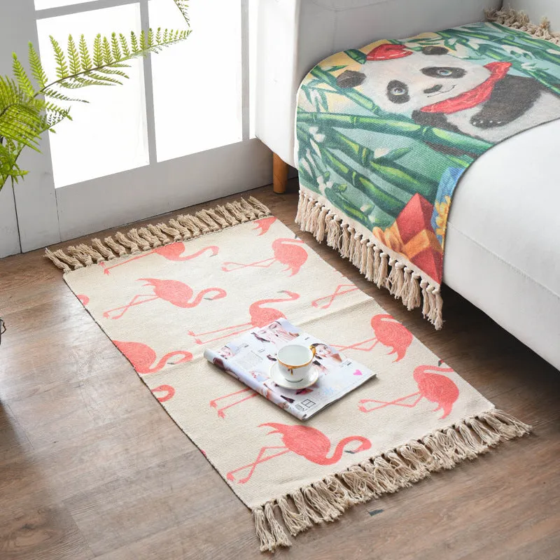 Handwoven cotton linen floor mat 60x90cm in ethnic style with natural plant dye, placed on a wooden floor