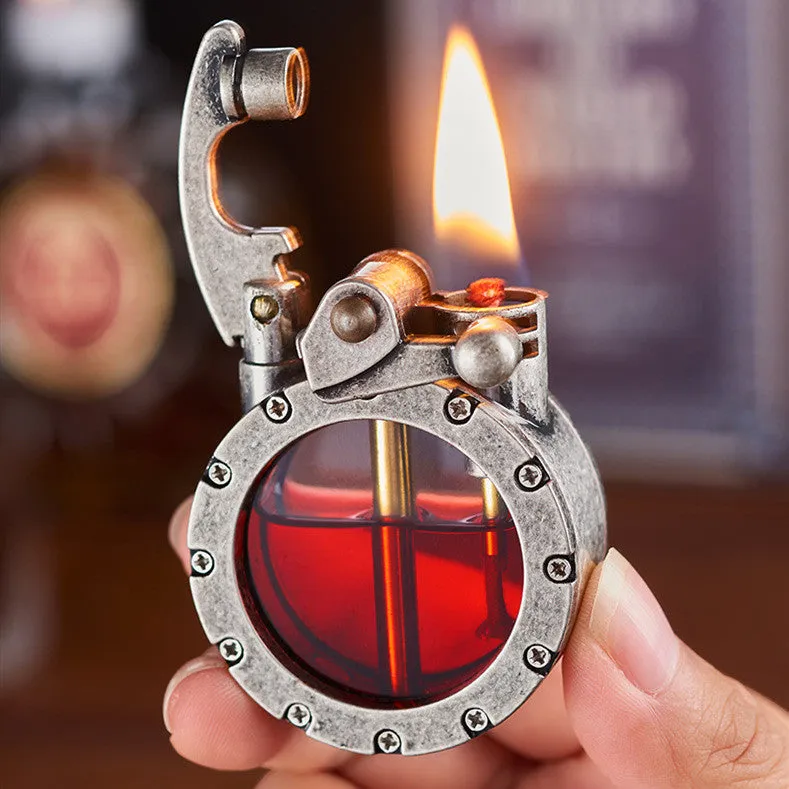 Metal rocker arm kerosene lighter with round transparent fuel tank zinc alloy body gold drawing finish