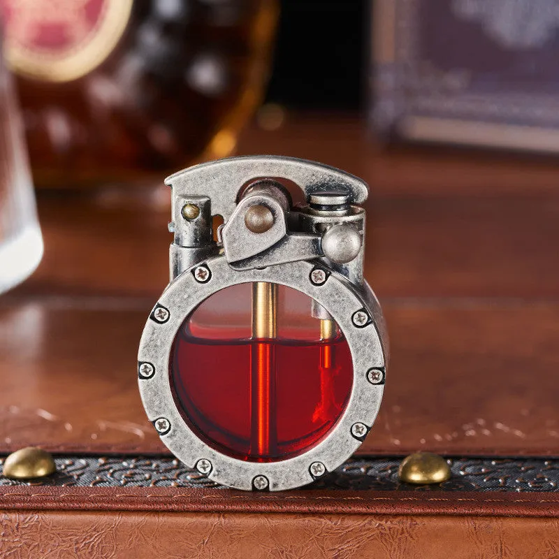 Metal rocker arm kerosene lighter with round transparent fuel tank zinc alloy body gold drawing finish