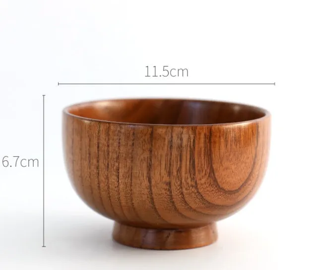Set of four round wooden bowls in natural wood colour from 10x6.5cm to 11.8x6.7cm