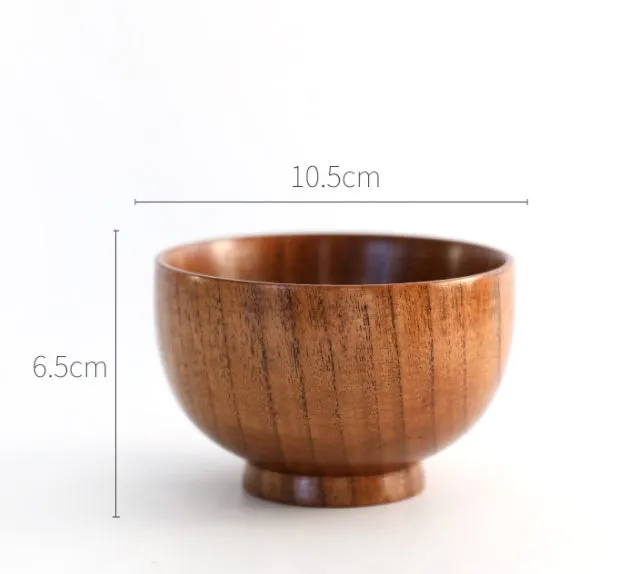 Set of four round wooden bowls in natural wood colour from 10x6.5cm to 11.8x6.7cm