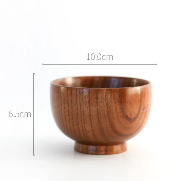 Set of four round wooden bowls in natural wood colour from 10x6.5cm to 11.8x6.7cm