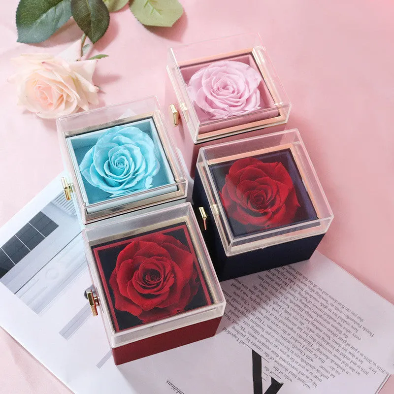 Acrylic rotating rose jewellery box in Chinese red with compartments for rings and earrings
