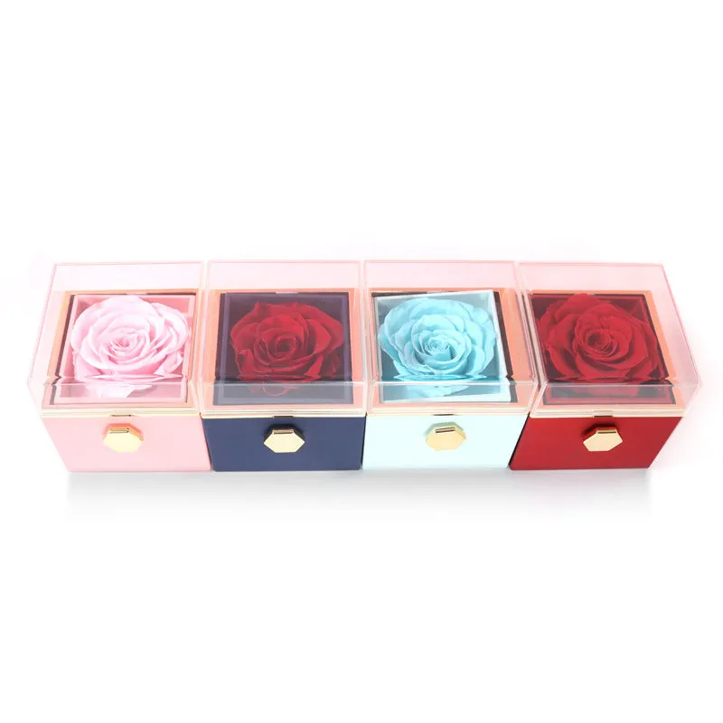 Acrylic rotating rose jewellery box in Chinese red with compartments for rings and earrings