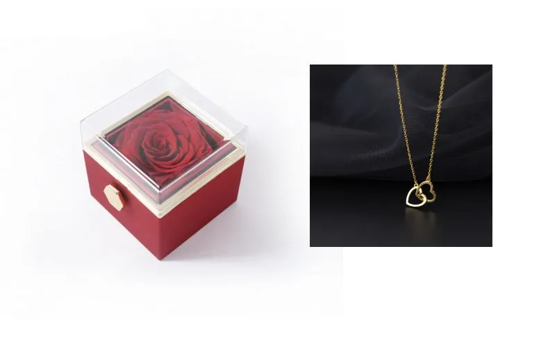 Acrylic rotating rose jewellery box in Chinese red with compartments for rings and earrings