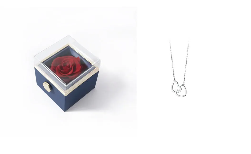 Acrylic rotating rose jewellery box in Chinese red with compartments for rings and earrings