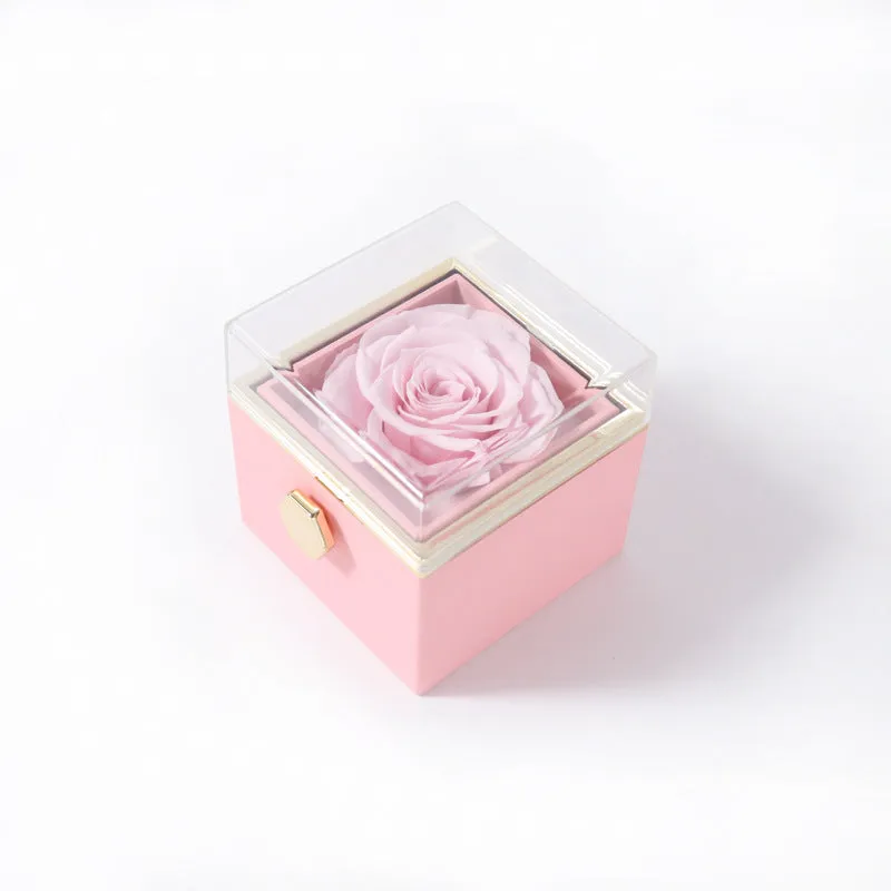 Acrylic rotating rose jewellery box in Chinese red with compartments for rings and earrings