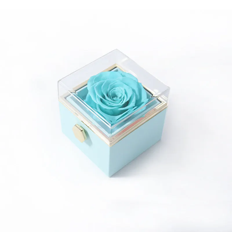 Acrylic rotating rose jewellery box in Chinese red with compartments for rings and earrings