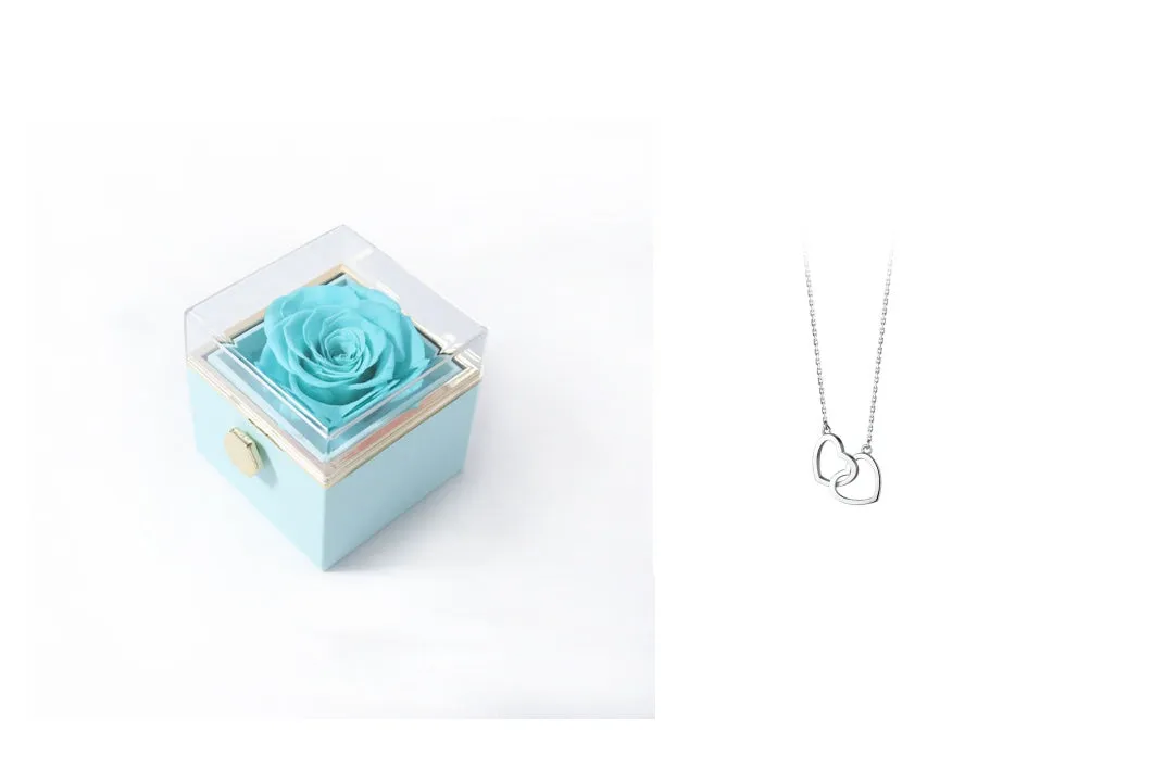 Acrylic rotating rose jewellery box in Chinese red with compartments for rings and earrings