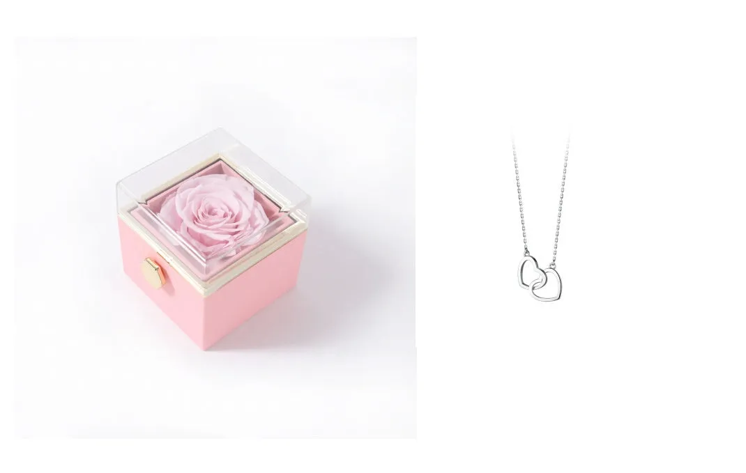 Acrylic rotating rose jewellery box in Chinese red with compartments for rings and earrings