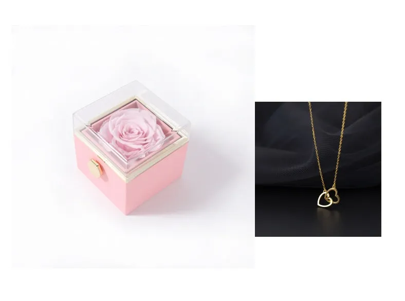 Acrylic rotating rose jewellery box in Chinese red with compartments for rings and earrings