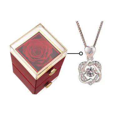 Acrylic rotating rose jewellery box in Chinese red with compartments for rings and earrings