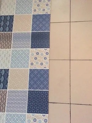 Machine-woven kitchen floor mat with geometric pattern in leather-like finish, available in 40x60cm size