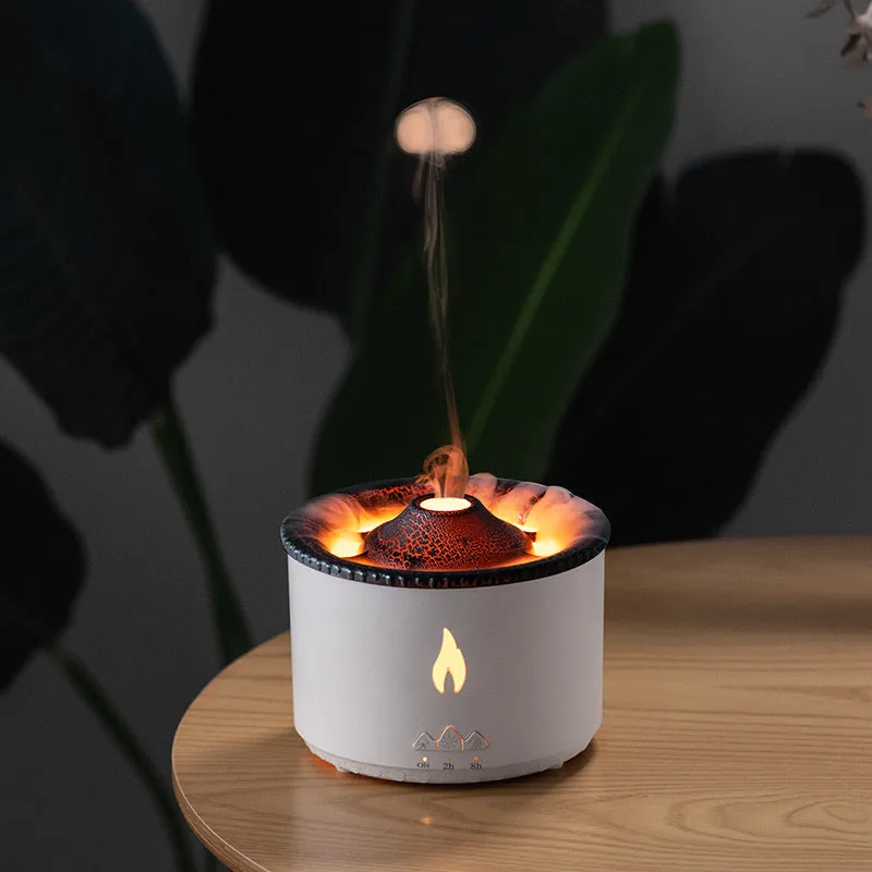 White flame and blue volcano humidifier diffuser with remote control on a table