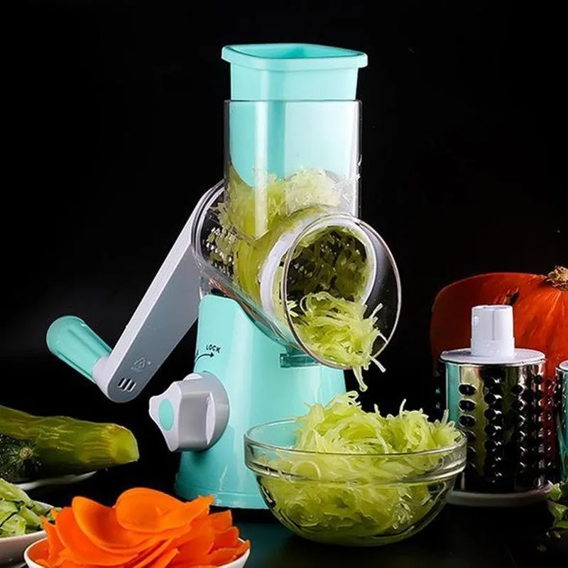 Spiralizer 3-blade vegetable slicer with transparent barrel and red plastic body on white background