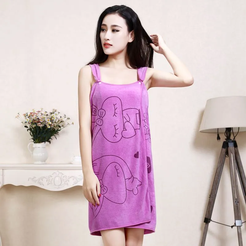 Lady's bath towel with suspenders in 80x138cm polyester polyamide blend, shown in thicken pink colour