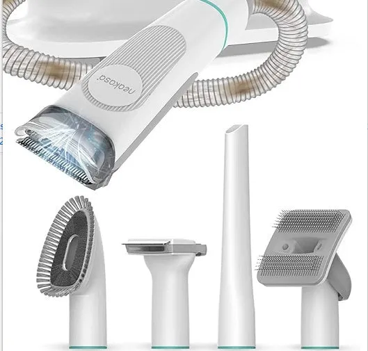 Pet grooming device on white background, ABS body, 290mm length, with trimming shears and massage comb accessories