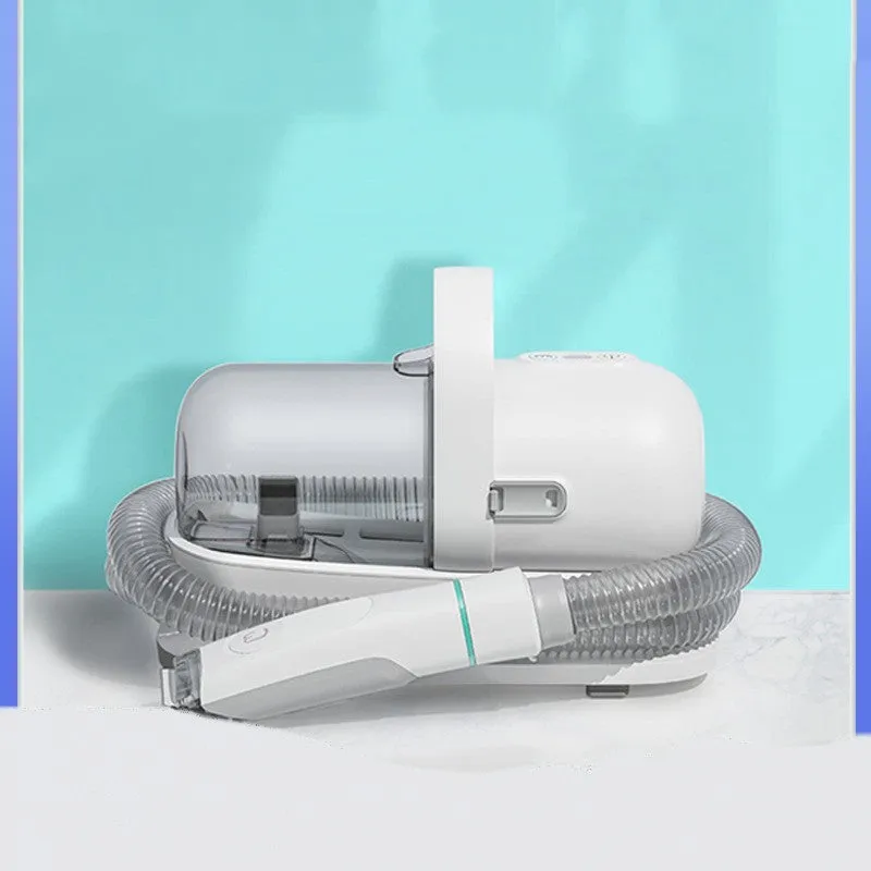 Pet grooming device on white background, ABS body, 290mm length, with trimming shears and massage comb accessories