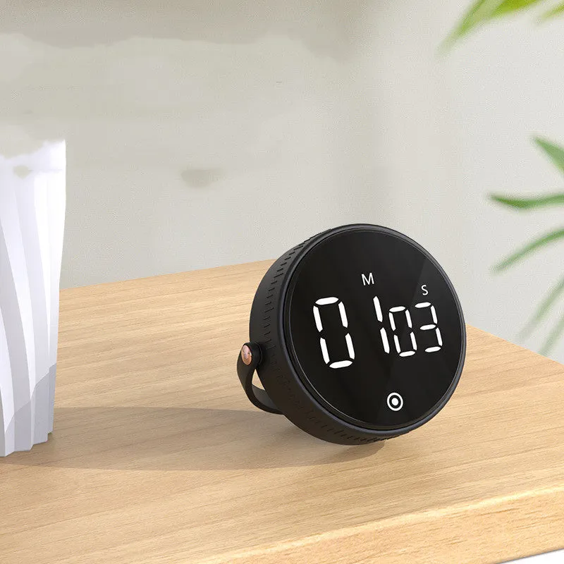 Black rotary digital timer with LED display showing 00:00, compact size