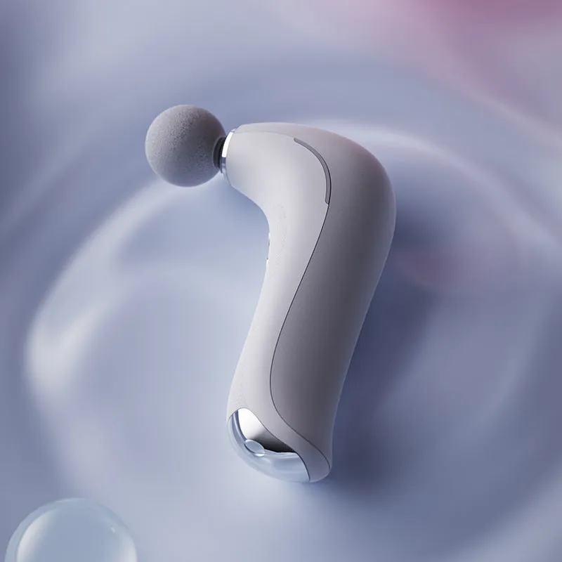 Mini electric massage gun with hot compress, LCD screen, and three massage heads in pink