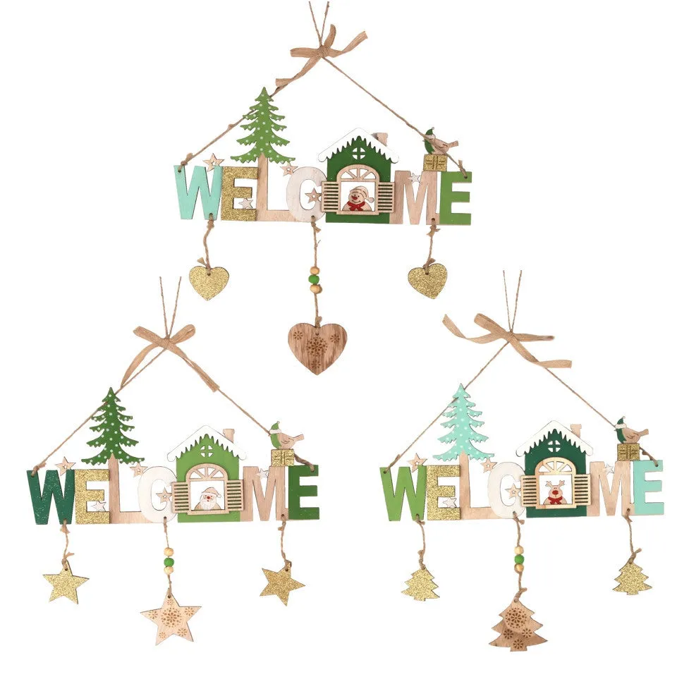 Wooden Christmas ornament set with old man, snowman and elk designs on display