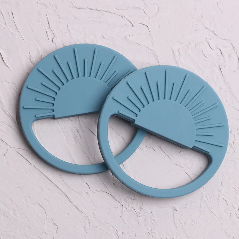 Silicone baby teether toy in multiple colours including pink and yellow, 88x88mm for infant teething relief