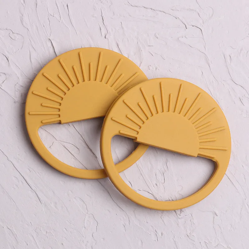 Silicone baby teether toy in multiple colours including pink and yellow, 88x88mm for infant teething relief