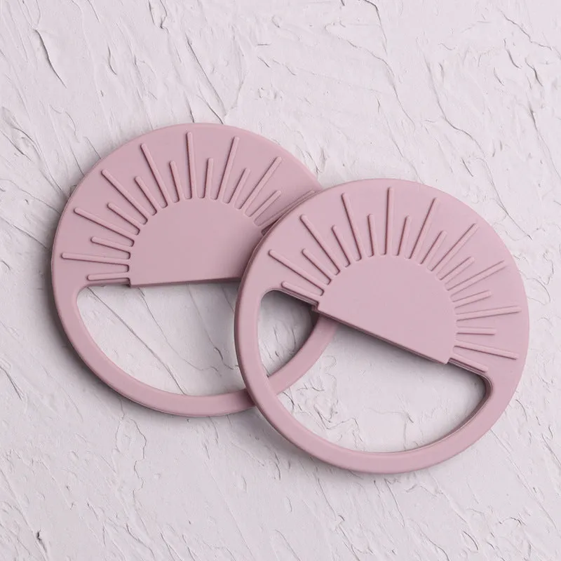 Silicone baby teether toy in multiple colours including pink and yellow, 88x88mm for infant teething relief